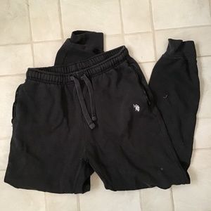 Black sweatpants with zipped pockets